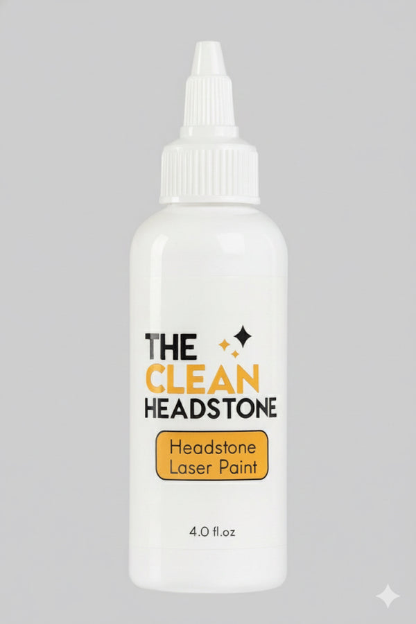Bottle of 'The Clean Headstone' headstone laser paint on a gray background
