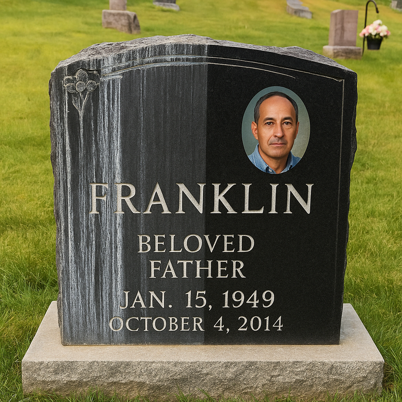Gravestone with portrait and name 'Franklin' in a cemetery